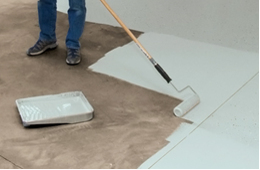 Worker Painting Floor
