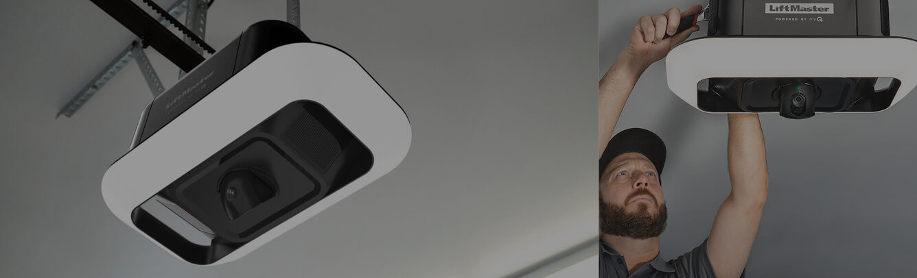 Technician installing a LiftMaster garage door opener in a residential garage in Lewiston, Maine