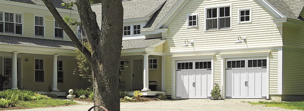 Eastman E-13, 9' x 7', Ice White door and overlays, 4 lite Panoramic windows