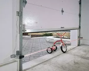 Garage door closing on a kid toy